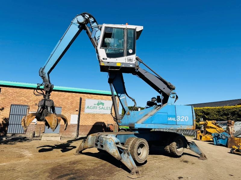 FUCHS MHL 320 HIGH RISE SCRAP HANDLER*C/W ROTATING SCRAP GRAB*VIDEO*