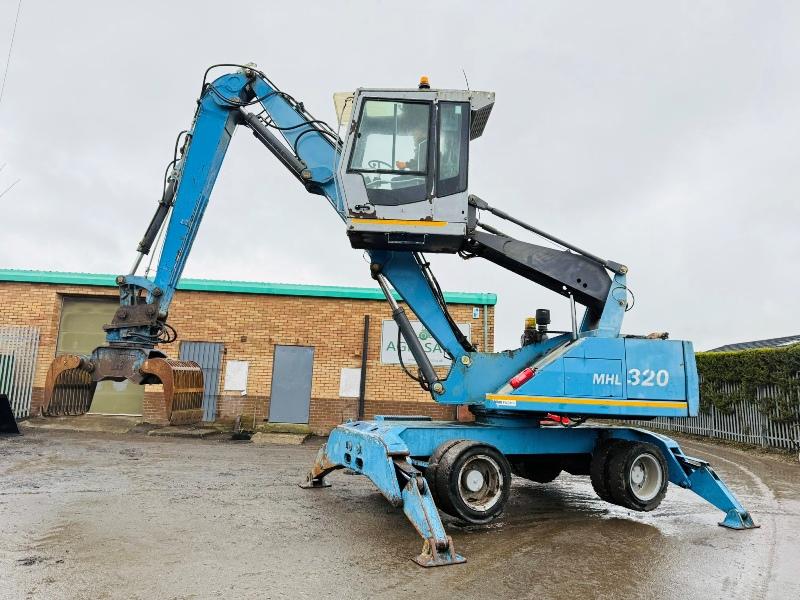FUCHS MHL 320 HIGH RISE SCRAP HANDLER*C/W ROTATING SCRAP GRAB*VIDEO*