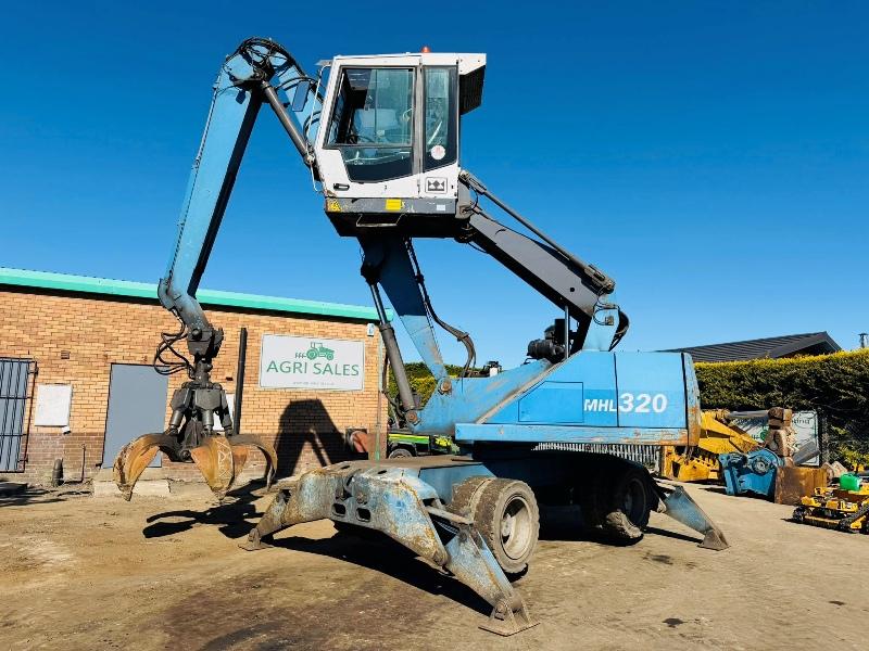 FUCHS MHL 320 HIGH RISE SCRAP HANDLER*C/W ROTATING SCRAP GRAB*VIDEO*