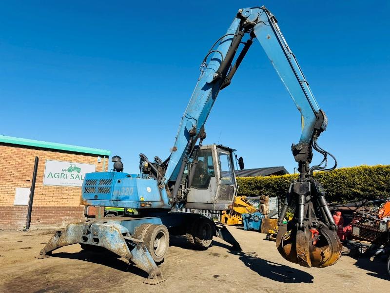 FUCHS MHL 320 HIGH RISE SCRAP HANDLER*C/W ROTATING SCRAP GRAB*VIDEO*