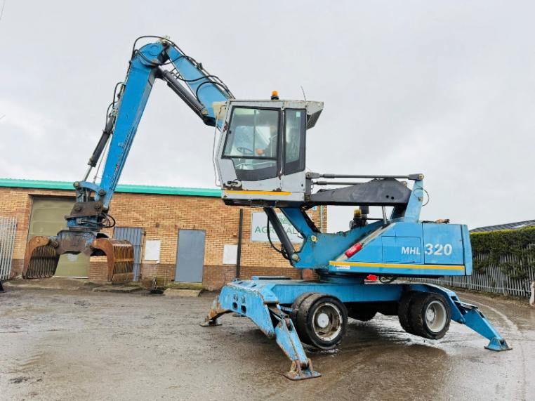 FUCHS MHL 320 HIGH RISE SCRAP HANDLER*C/W ROTATING SCRAP GRAB*VIDEO*