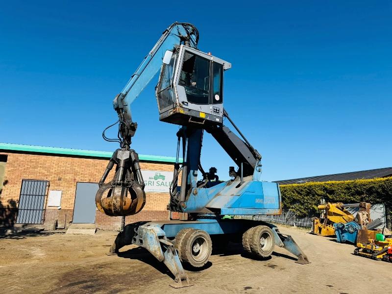 FUCHS MHL 320 HIGH RISE SCRAP HANDLER*C/W ROTATING SCRAP GRAB*VIDEO*