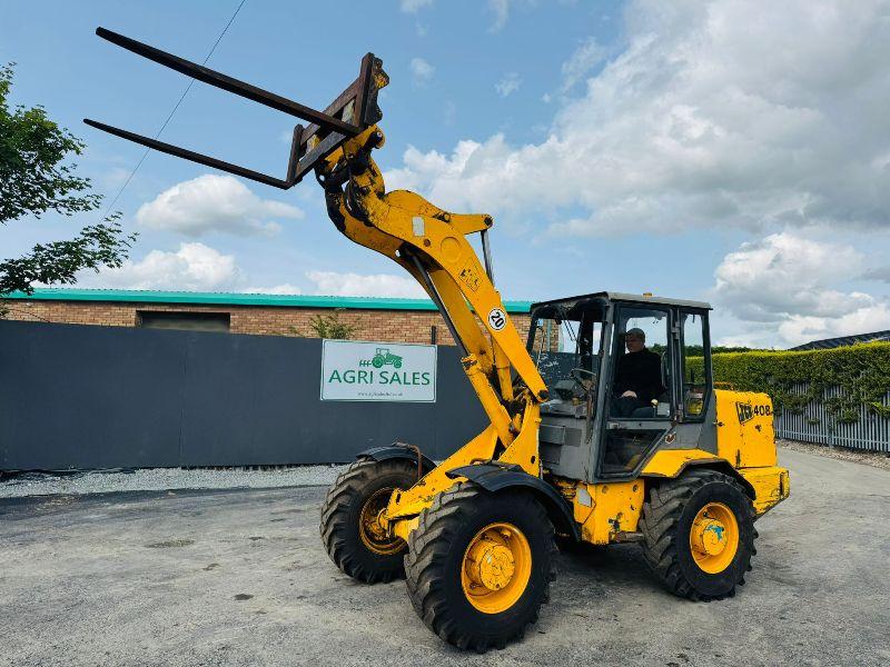 JCB 408 PIVOT STEER HANDLER *C/W LONG PALLET TINES*VIDEO*