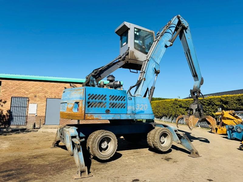 FUCHS MHL 320 HIGH RISE SCRAP HANDLER*C/W ROTATING SCRAP GRAB*VIDEO*