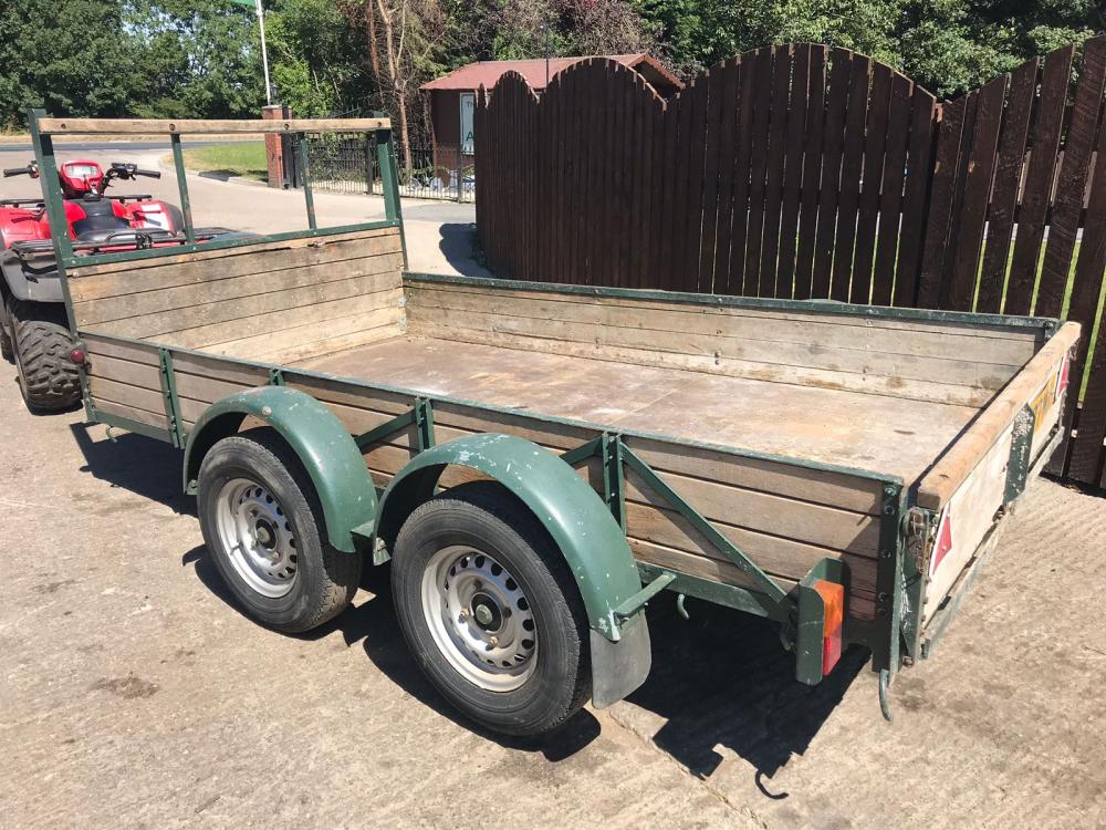 TWIN AXEL WOODEN TRAILER ON LAND ROVER WHEELS