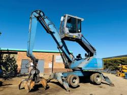 FUCHS MHL 320 HIGH RISE SCRAP HANDLER*C/W ROTATING SCRAP GRAB*VIDEO*