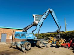 FUCHS MHL 320 HIGH RISE SCRAP HANDLER*C/W ROTATING SCRAP GRAB*VIDEO*