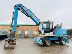 FUCHS MHL 320 HIGH RISE SCRAP HANDLER*C/W ROTATING SCRAP GRAB*VIDEO*