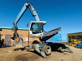 FUCHS MHL 320 HIGH RISE SCRAP HANDLER*C/W ROTATING SCRAP GRAB*VIDEO*