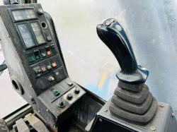 FUCHS MHL 320 HIGH RISE SCRAP HANDLER*C/W ROTATING SCRAP GRAB*VIDEO*