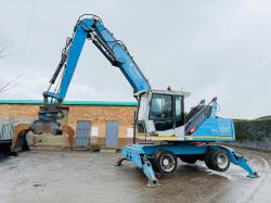 FUCHS MHL 320 HIGH RISE SCRAP HANDLER*C/W ROTATING SCRAP GRAB*VIDEO*