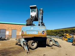 FUCHS MHL 320 HIGH RISE SCRAP HANDLER*C/W ROTATING SCRAP GRAB*VIDEO*